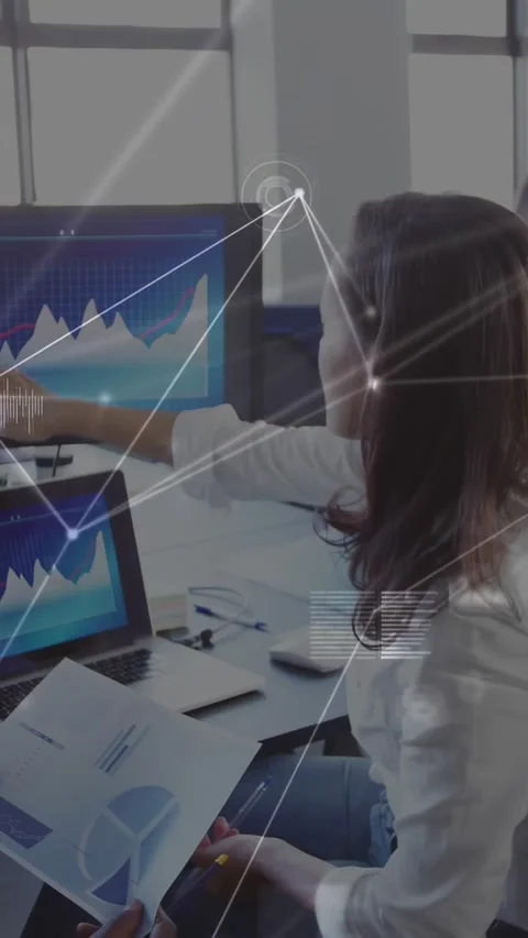 Analyst clicking, pointing at charts and report, discussing data in office, Stock Footage 331215400