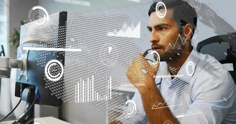 Analyst at desk acting on data alert, analyzing monitor while HUD overlays Stock Photos