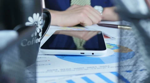 Analyst Earnings And Coffee Stock Footage 64058308