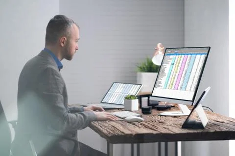 Analyst Employee Working With Spreadsheet Stock Photos