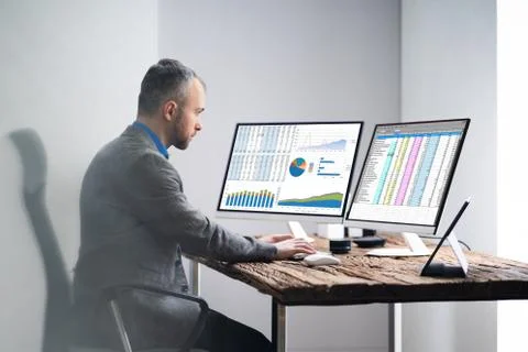 Analyst Employee Working With Spreadsheet Stock Photos