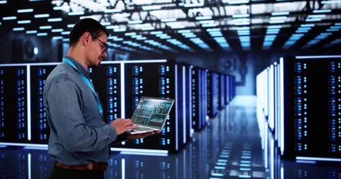 Analyst Engineer In Cloud Data Center Using Computer Stock Photos