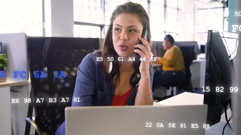 Analyst receiving business call, using chart, entering data to update report Stock Footage 333221099