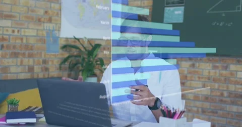 Analyst scrolling laptop in studio, generating and adjusting analytics bar, line Stock Footage 331214443