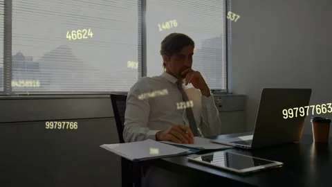 Analyst studying laptop and analyzing finance as live data creating floating Stock Footage 334703237