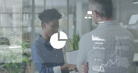 Analyst tapping tablet in tech office, expanding cloud and creating charts with Stock Footage 318047026