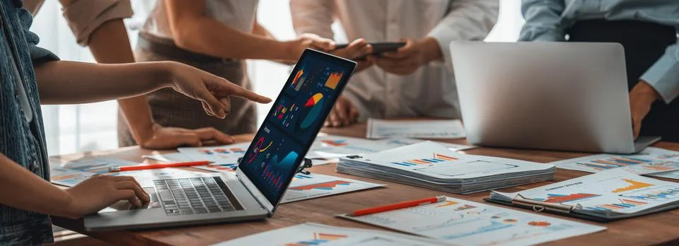 Analyst team utilizing BI Fintech to analyze financial report. Scrutinize Stock Photos