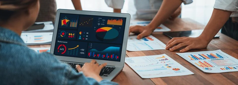 Analyst team utilizing BI Fintech to analyze financial report. Scrutinize Stock Photos