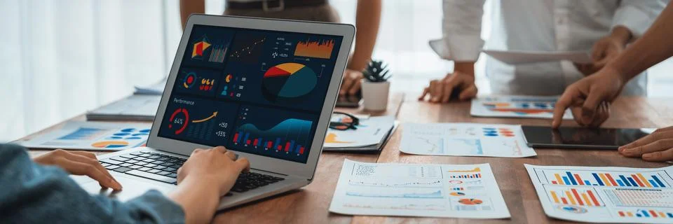 Analyst team utilizing BI Fintech to analyze financial report. Scrutinize Stock Photos