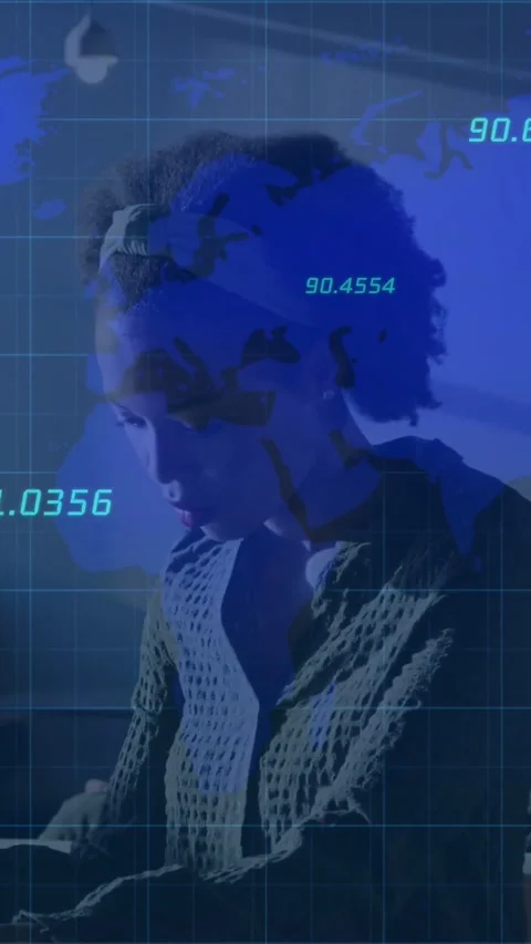 Analyst typing at laptop, doing tech analysis while blue HUD map overlay casting Stock Footage 331739298