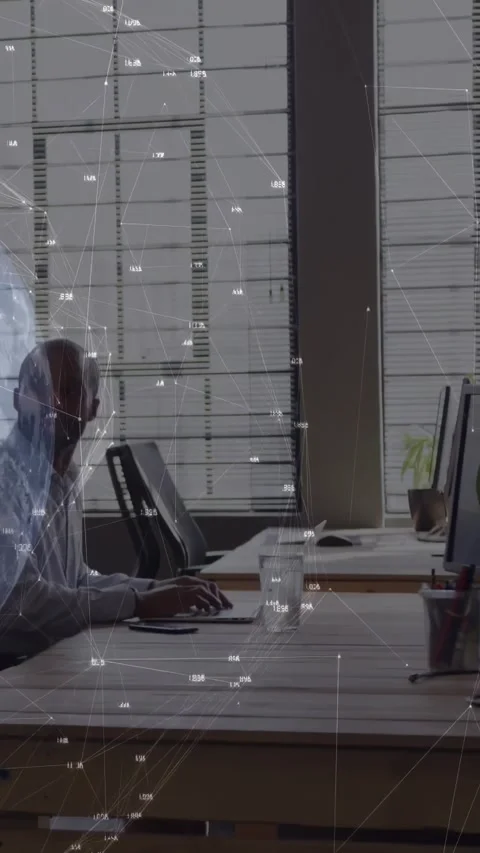 Analyst typing in tech office activating graph overlay smiling at offscreen Stock Footage 331215402