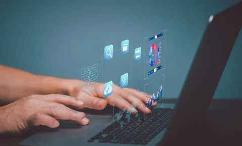 Analyst working with Business Analytics and Data Management System on compute Stock Photos