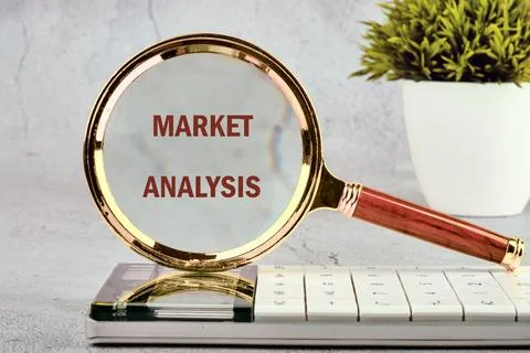 Analyst working on data analysis. Text MARKET ANALYSIS on a gray background s Stock Photos