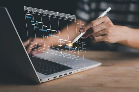 Analyst working or Project management with smartpen, laptop (Notebook) in S.. Stock Photos