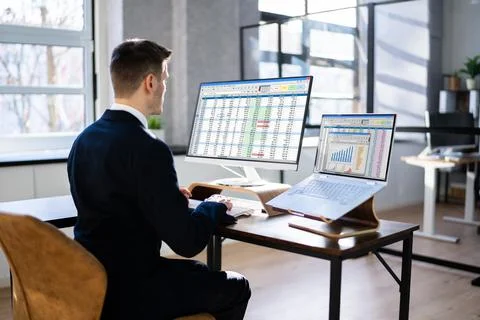 Analyst Working With Spreadsheet Business Data Stock Photos