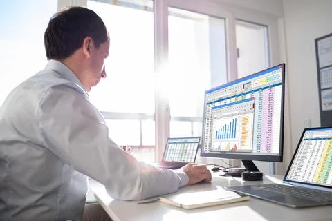 Analyst Working With Spreadsheet Business Data Stock Photos