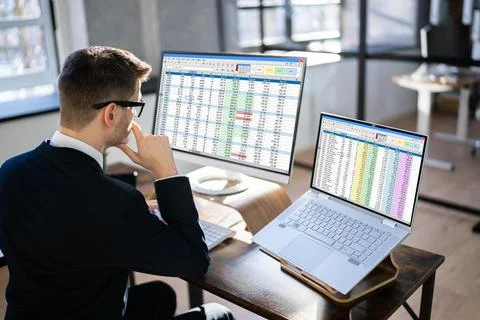 Analyst Working With Spreadsheet Business Data Stock Photos
