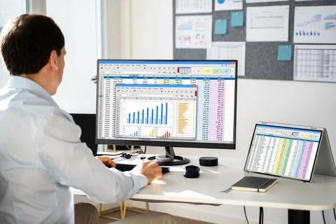 Analyst Working With Spreadsheet Business Data Stock Photos