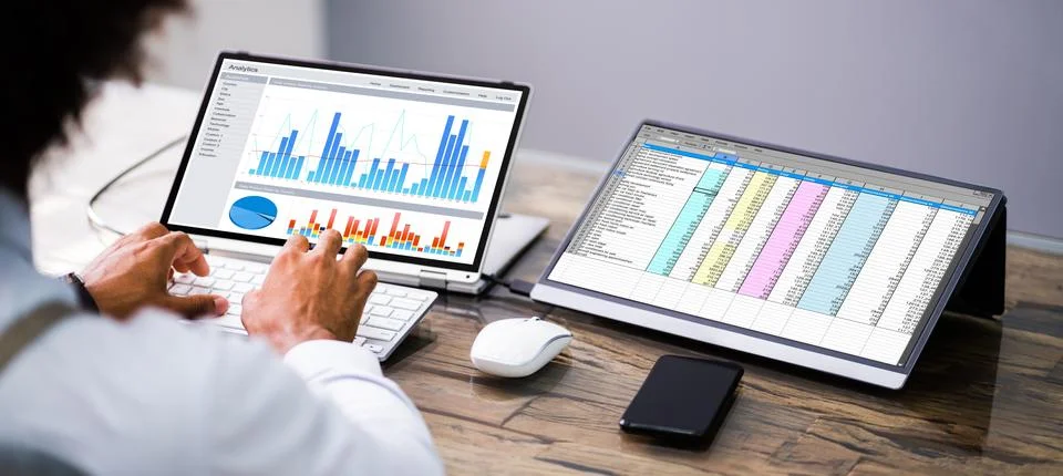 Analyst Working With Spreadsheet Data Stock Photos