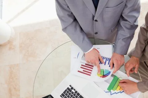 Analysts looking at research data Stock Photos