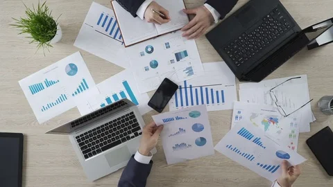 Analysts studying opinion poll statistics, preparing election campaign strategy Stock Footage
