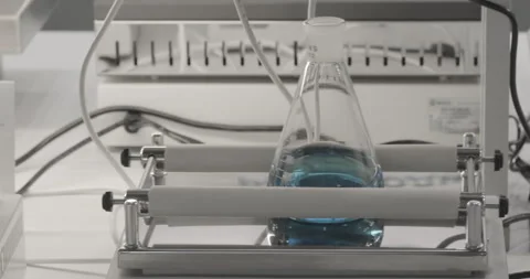Analytical laboratory.  Mixing of the solution. Laboratory Mixer. Video stock 193580146