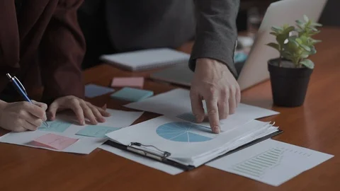 Analytics, bit coin, financial discussion. Team work female and male hands Stock Footage 129267164