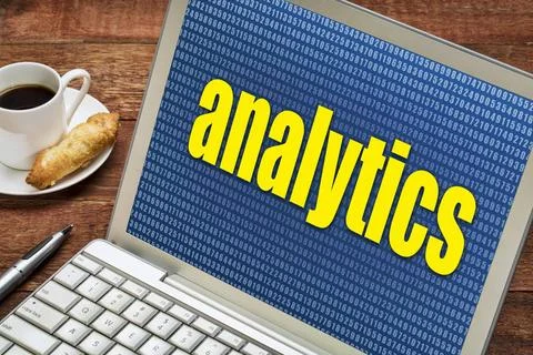  analytics concept on laptop analytics word against random number backgrou... Stock Photos