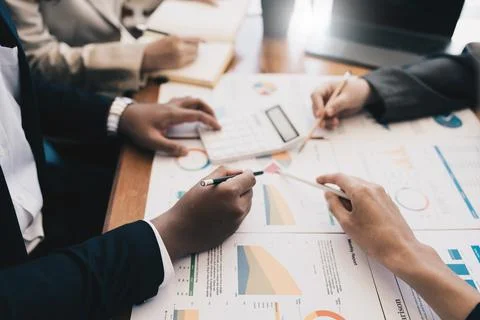 Analytics intelligence concept. Group of business people discuss current Foto stock