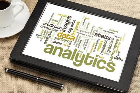  analytics word cloud on digital tablet cloud of words or tags related to ... Stock Photos