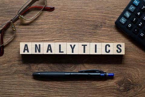 Analytics - word concept on building blocks, text Stock Photos