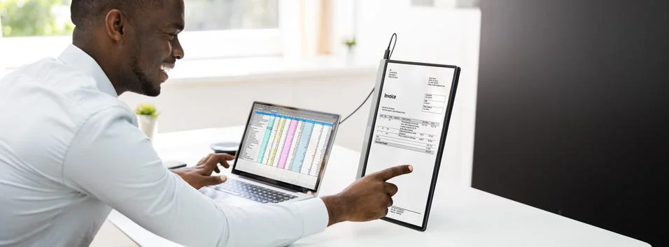 Analyze Spreadsheet Data On Laptop Stock Photos