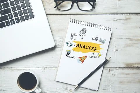 Analyze text on notepad with keyboard Stock Photos