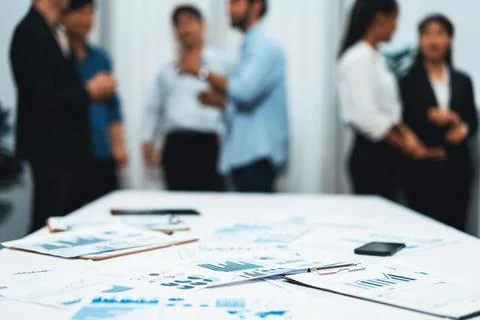 Analyzed financial data visualized papers on meeting table. Prudent Foto stock