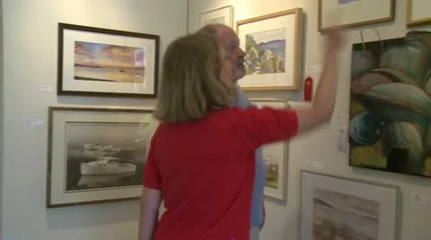 Analyzing and choosing art (3 of 3) Stock Footage 19649651