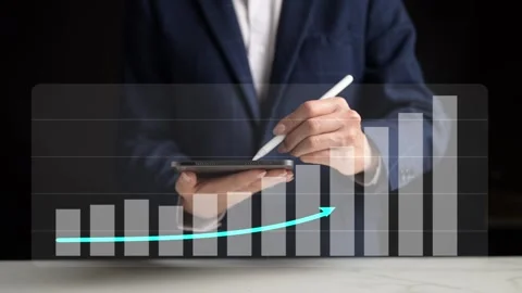 Analyzing Business Growth Trends with Data Visualization Tools Office Stock Footage 296569343