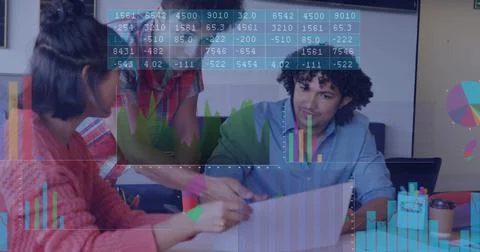 Analyzing charts, three team members with pink sweater at office table, laptop Stock Photos