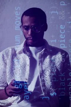 Analyzing Code on Smartphone with Concentration Stock Photos