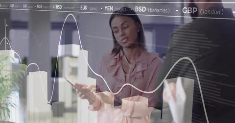 Analyzing colleagues in office discussing graphs on digital screen, with tablet 库存照片