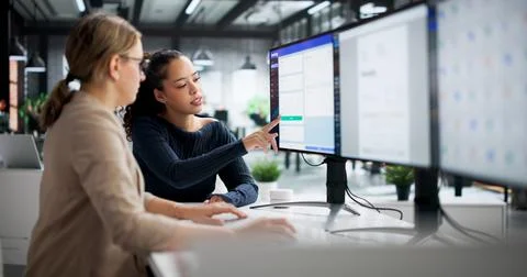 Analyzing Corporate Invoices On Computer Software In Office Setting. Busy Acc Stock Photos