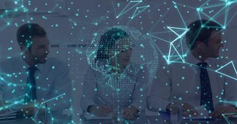 Analyzing corporate professionals interpreting digital globe at meeting table, Stock Photos