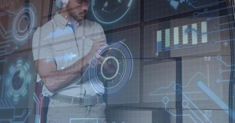 Analyzing data analyst interacting with display wall in lab, wearing headset, Stock Photos