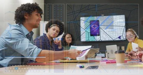 Analyzing data and charts image over diverse team in meeting room 写真素材