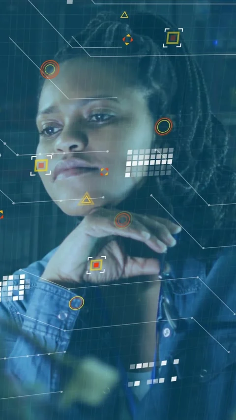 Analyzing data with animation overlay, woman in denim jacket focusing on work Stock Footage 319810889