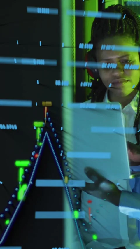 Analyzing data charts and graphs, business professionals working in server room Stock Footage 344244748