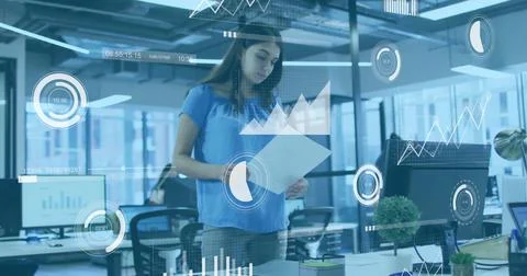 Analyzing data charts and graphs, businesswoman in office with digital image 写真素材
