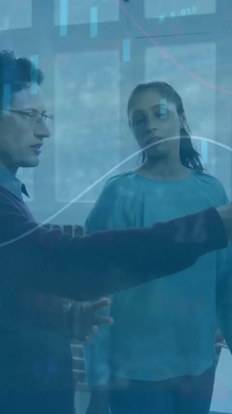 Analyzing data charts animation over business professionals discussing in office Stock Footage 342916158