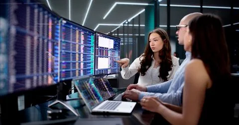 Analyzing Data On Desktop To Create Report With Diverse Team. Stock Photos