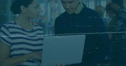 Analyzing data with digital animation, diverse business professionals using Stock Footage 326626254