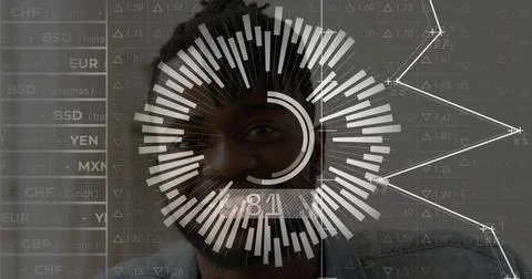 Analyzing data, man wearing denim shirt viewing radial bar chart and currency 스톡 사진